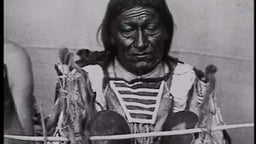 Older Native American man in traditional dress